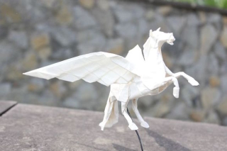 Illustration for article titled Papercraft Genius Creates Origami Dragons, Grim Reaper, and More